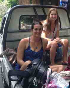 Sarah and Allison, on the back of a pickup - our transport to Aas.